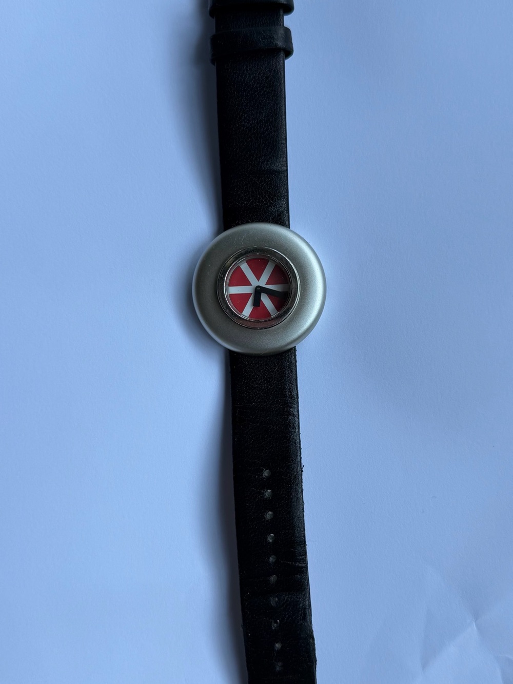Alessi Black Strap Watch with Silver Case and Red Dial
